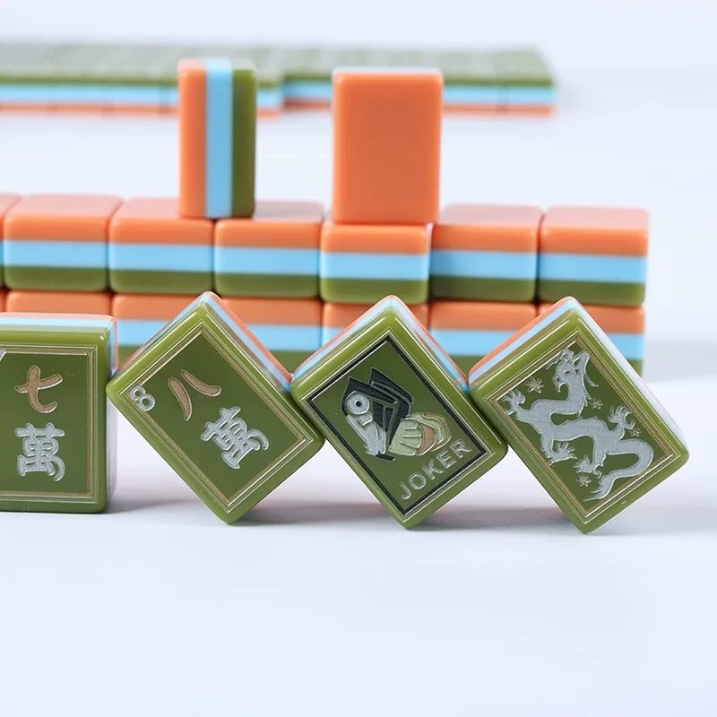 Acrylic Mahjong tiles front side green middle cyan and back sunset yellow color detail close up