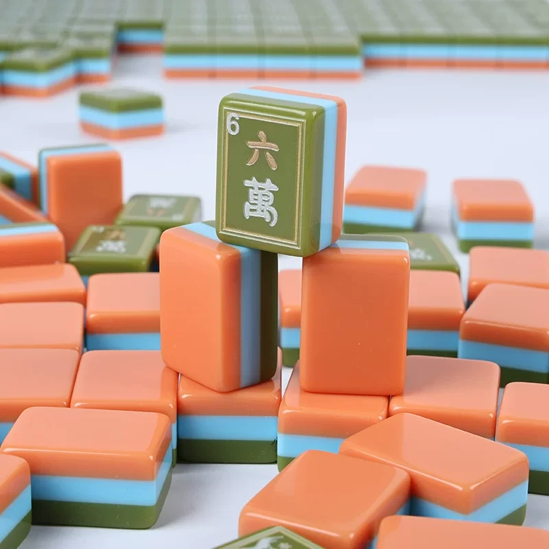 Stacked acrylic Mahjong tiles showing thickness and abstract oil painting style design details