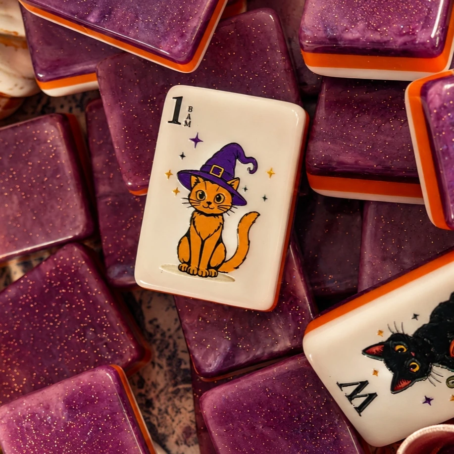 Halloween Mahjong Bam tile featuring a witch-hat cat with multiple tails