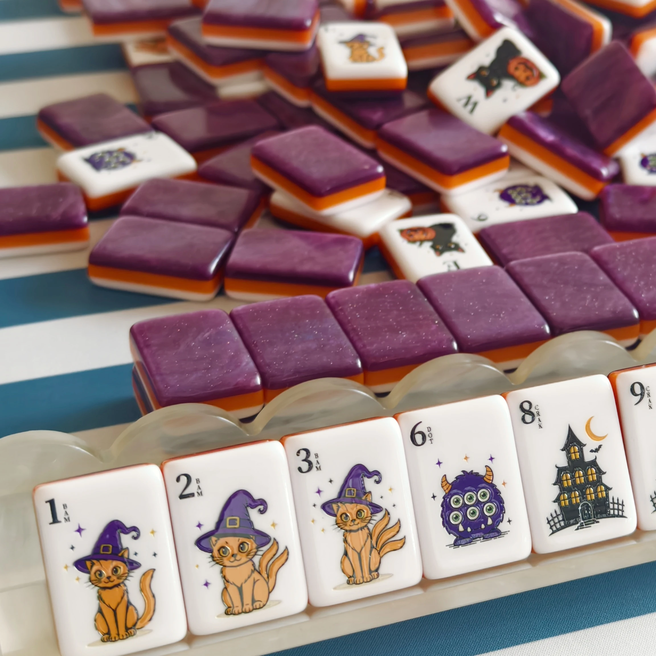 Halloween Mahjong Tiles displayed on Mahjong tile racks during game night