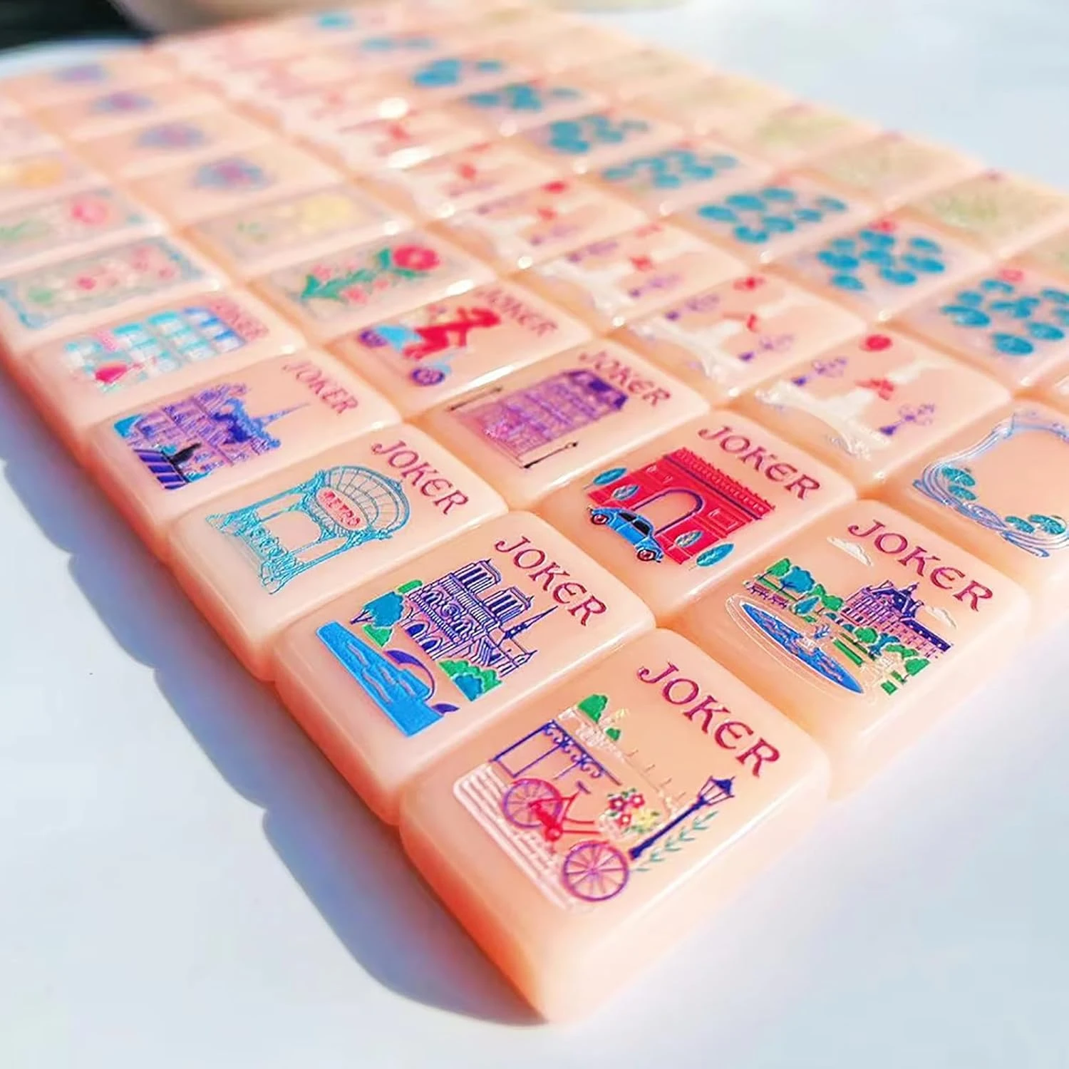 Close-up view of Pink Paris Mahjong Joker tiles with Paris scenery artwork