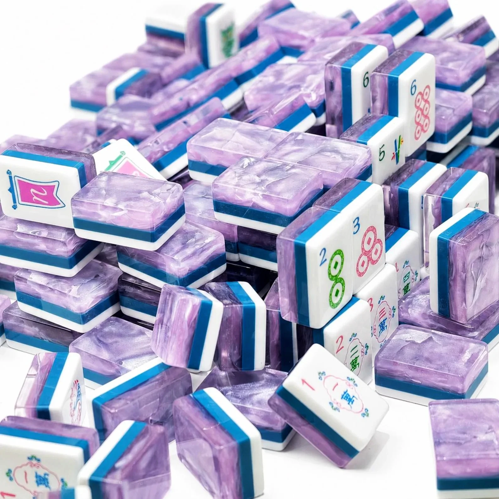 Purple Sanctuary Mahjong Tiles scattered on white background showing triple-layer acrylic construction