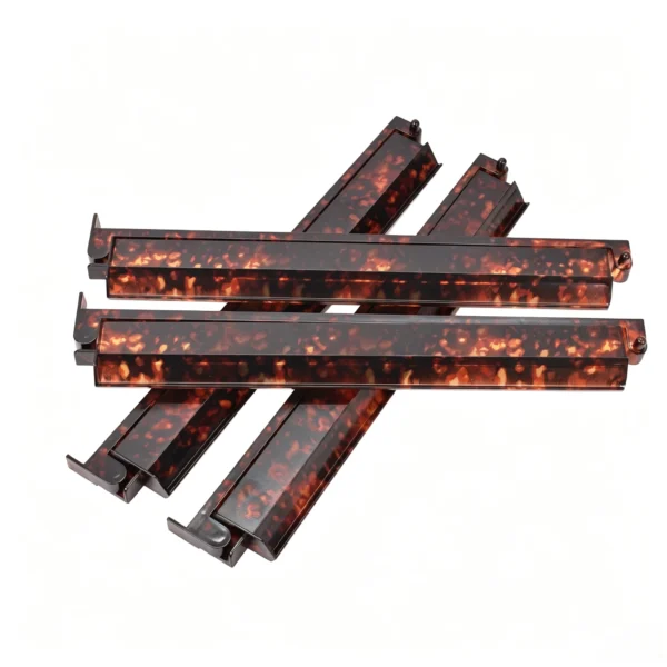 Tortoise shell ABS Mahjong rack and pusher set of 4 on white background